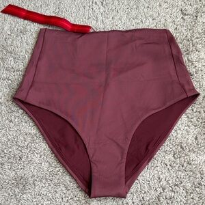 Left on Friday Hi Tide Bottom. NWT desert plum